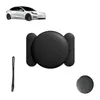A white Tesla car, a black car accessory, and a black strap are arranged on a white background. Produktbild-Vorschau