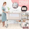 A woman stands next to a beige baby bassinet, with inset images showing the bassinet being carried and stored, and a close-up of its wheels. Produktbild-Vorschau