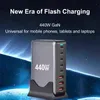 A dark, futuristic background with glowing blue lines, featuring a multi-port charging station. Produktbild-Vorschau
