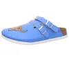 A single blue Birkenstock clog with a cartoon dog graphic on a white background. Náhled obrázku produktu