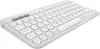 A white wireless keyboard with a white wrist rest is shown from a diagonal angle against a white background. Produktbild-Vorschau