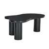 A black, cloud-shaped coffee table with three cylindrical legs, presented on a white background. Voir les images du produit