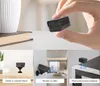 A collage showing a mini camera and its different mounting options. Produktbild-Vorschau