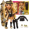 A collage of a doll and its accessories, presented in packaging and laid out separately. Podgląd zdjęcia produktu
