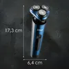 A blue and silver electric shaver is shown against a dark, textured background, with dimensions indicated by white lines and text. Produktbild-Vorschau