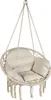 A cream-colored hanging chair with cushions and fringe, suspended by ropes against a white background. Voir les images du produit