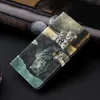 A wallet-style phone case with a cat and tiger design is displayed on a dark surface, with a watch partially visible in the background. Produktbild-Vorschau