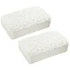 Two white, porous rectangular blocks, likely pumice stones or similar bath/spa accessories, are presented against a white background. Anteprima dell’immagine prodotto