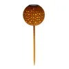 A solar-powered garden light with a spherical, star-patterned head and a pointed stake. Produktbild-Vorschau