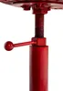 A close-up view of the height adjustment mechanism of a red bar stool. Náhled obrázku produktu