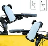 Two bicycle handlebars with phone mounts attached, one above the other, against a white and yellow background. The top mount holds a phone and is attached to a handlebar with a grey grip. The bottom mount also holds a phone and is attached to another handl Produktbild-Vorschau
