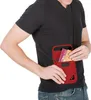 A person wearing a black t-shirt and blue jeans is holding a red neck pouch with passports and cards inside. Voir les images du produit