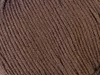 A close-up, textured view of brown yarn. Produktbild-Vorschau