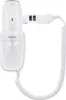 A white wall-mounted hairdryer with a coiled cord. Produktbild-Vorschau