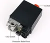 A close-up studio shot of an air compressor pressure switch with labels pointing to its components. Produktbild-Vorschau