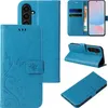 Collage of a blue floral and butterfly embossed flip phone case for a Samsung Galaxy A56 5G. Produktbild-Vorschau