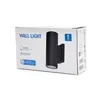The image shows the retail packaging of a black wall light. Produktbild-Vorschau