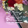 A clear acrylic puzzle-shaped decoration with text and floral elements, placed in front of a bouquet of flowers. Náhľad obrázku produktu