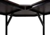 Underside view of a corner desk with dark brown wood and black metal legs. Náhled obrázku produktu