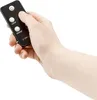 A hand holding a black remote control with buttons labeled '650W', '2000W', and a power symbol. Produktbild-Vorschau