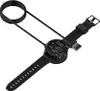 A black smartwatch charging cable with a USB-A connector and a round base is shown on a white background. Anteprima dell’immagine prodotto
