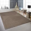Moderner Teppich Braun mit 3D-Kreismuster für Wohn- und Produktbild-Vorschau 1