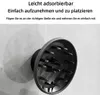 A close-up of a hair dryer diffuser attached to a wall. Produktbild-Vorschau