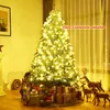 A decorated Christmas tree with presents underneath, in a room with warm lighting. Voir les images du produit