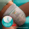A close-up of a baby's diaper with a cartoon tiger on it, highlighting a feature with an inset image and text. Podgląd zdjęcia produktu