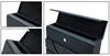 Collage of close-up shots of a black mailbox, showing its interior and opening mechanism. Náhled obrázku produktu