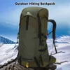 A green hiking backpack is shown against a backdrop of snowy mountains and a blue sky. Náhľad obrázku produktu