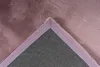 A close-up view of the corner of a rug, showing the texture of the pile and the binding. Produktbild-Vorschau