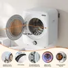 A white mini clothes dryer is mounted on a wall, with its door open to reveal the drum. Several close-up insets highlight features. Produktbild-Vorschau