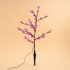 A decorative LED light tree with pink flowers against a plain background. Produktbild-Vorschau