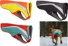 A collage of dog jackets and a dog wearing one in the snow. Produktbild-Vorschau