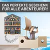 A child playing with a toy boat and binoculars, with a shelf of toys in the background. Produktbild-Vorschau