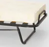 A close-up view of a folded bed with a mattress and frame. Anteprima dell’immagine prodotto