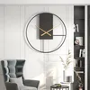 A modern living room with a large wall clock as the focal point. Produktbild-Vorschau