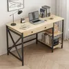 A home office desk setup with a laptop, books, and a lamp. Náhľad obrázku produktu