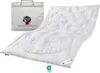 A white duvet and a white storage bag are displayed against a white background. Produktbild-Vorschau