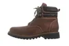 A side view of a brown leather boot. Voir les images du produit