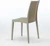 A single beige poly rattan chair shown from a side angle against a white background. Produktbild-Vorschau