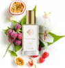 A perfume bottle surrounded by fruits and flowers. Produktbild-Vorschau
