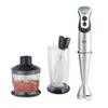A set of kitchen appliances including a hand blender, a whisk in a beaker, and a chopper with food inside. Voir les images du produit