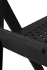 Close-up detail of a black folding chair, showing its texture and construction. Produktbild-Vorschau