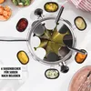 A fondue set with various dipping sauces arranged around it, with some ingredients in bowls in the background. Produktbild-Vorschau