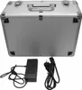 A silver carrying case with accessories, including a power adapter and power cord, displayed against a light gray background. Náhled obrázku produktu