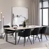 A dining room scene with a table and chairs, a large painting on the wall, and a floor lamp. Náhled obrázku produktu