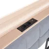 A close-up view of a bed headboard with integrated charging ports and a wooden shelf. Anteprima dell’immagine prodotto