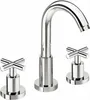 A chrome faucet with two cross-shaped handles. Podgląd zdjęcia produktu